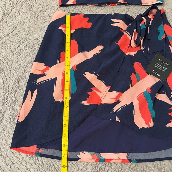 Lulu’s Navy Abstract Print wrap skirt with cropped halter top set. - Picture 7 of 9